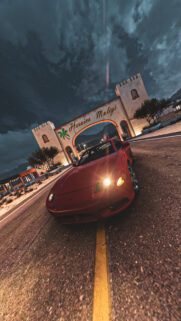 Red Sports Car at Heroica Mulege Night Landscape Wallpaper