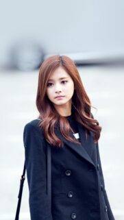 Tzuyu TWICE Elegant Portrait in Black Coat Mobile Wallpaper
