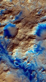 High Resolution Aerial View of Mars Surface with Blue Crater Deposits Wallpaper