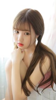 Beautiful Young Asian Woman with Pigtails Portrait Mobile Wallpaper