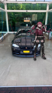 Anime Girl with Nissan Skyline GTR R34 Car Wash Wallpaper