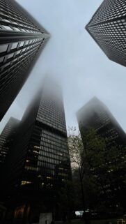 Low Angle City Skyscrapers in Foggy Weather Mobile Wallpaper