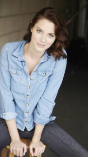 Stunning Portrait of a Young Woman in Denim Shirt Mobile Wallpaper