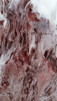 Stunning Aerial View of Earth Abstract Landscape in Deep Maroon and White Tones