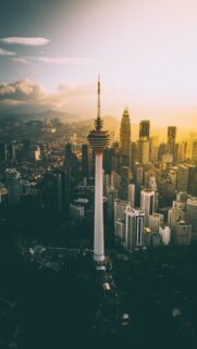 Stunning Aerial View of Kuala Lumpur City Skyline at Sunset Mobile Wallpaper