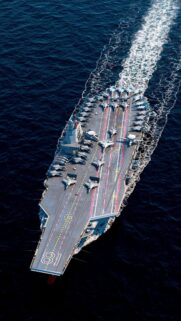 Stunning Aerial View of Aircraft Carrier 18 with Fighter Jets Wallpaper