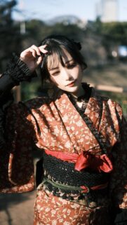 Beautiful Young Woman in Floral Kimono Portrait Wallpaper