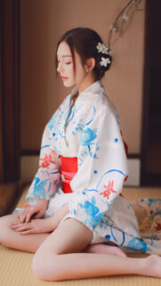 Beautiful Young Woman in Traditional Japanese Yukata with Goldfish Pattern Wallpaper