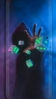 Mysterious Hooded Figure with Neon Glowing Dice Mobile Wallpaper