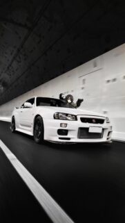 Nissan Skyline GT-R R34 with Anime Girl Driver Wallpaper for Mobile