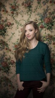 Stunning Portrait of Amanda Seyfried Against Vintage Floral Wallpaper