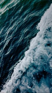 Deep Ocean Waves Mobile Wallpaper: Stunning Dark Blue Sea Foam Abstract Background