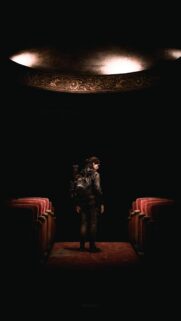 Ellie Standing Alone in Theater The Last of Us Part II Mobile Wallpaper