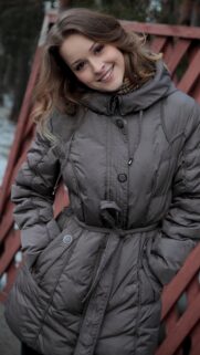 Beautiful Smiling Girl in Winter Coat Portrait Wallpaper