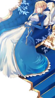 Elegant Saber Fate Stay Night Anime Girl Resting on Royal Blue Sofa Wallpaper
