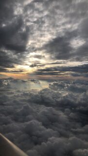 Stunning Aerial View of Above the Clouds at Sunset High Quality Wallpaper