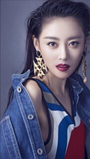 Stunning Asian Celebrity Portrait in Denim Jacket Mobile Wallpaper