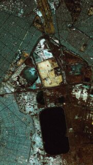 Stunning Satellite Aerial View of Urban Landscape and Industrial Infrastructure Mobile Wallpaper