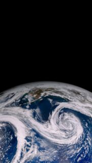 Breathtaking Satellite View of Earth from Space with Swirling Clouds Wallpaper