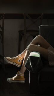 Aesthetic Legs in Yellow Converse High Tops Wallpaper for Mobile