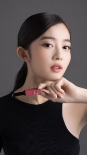 Elegant Asian Woman With NARS Lipstick Portrait Wallpaper for Mobile