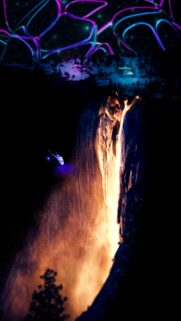 Stunning Sci-Fi Fantasy Waterfall with Glowing UFO and Neon Night Sky Mobile Wallpaper