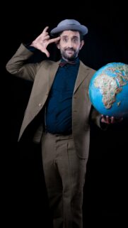 Man Holding Globe with Suit and Hat Professional Concept Wallpaper