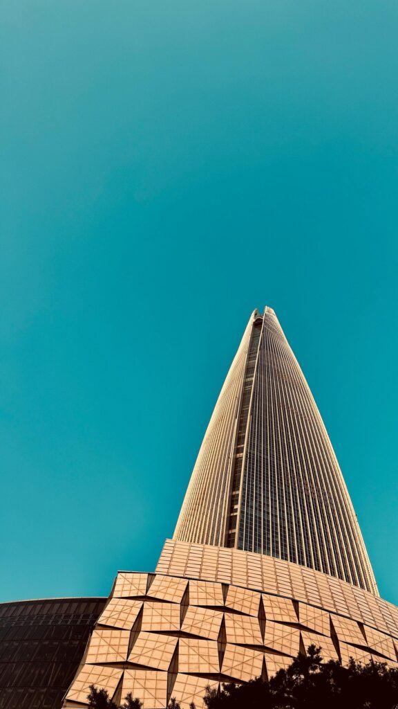 Lotte World Tower Skyscraper Against Clear Blue Sky Wallpaper