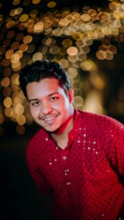 Handsome Man in Red Kurta Bokeh Lights Portrait Wallpaper