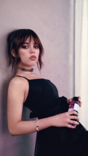 Stunning Jenna Ortega Portrait in Elegant Black Dress Mobile Wallpaper