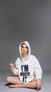 Cara Delevingne I Am Worth It White Hoodie Wallpaper for Mobile