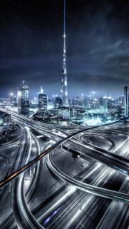Stunning Dubai Night Cityscape with Burj Khalifa and Light Trails Wallpaper