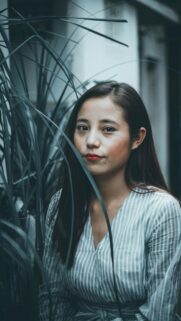 Beautiful Young Asian Woman in Striped Shirt Portrait Wallpaper