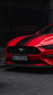 Red Ford Mustang with Black Racing Stripes Sportscar Wallpaper