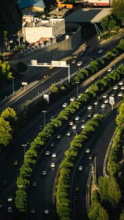 Aerial View of Busy City Highway at Sunset Phone Wallpaper