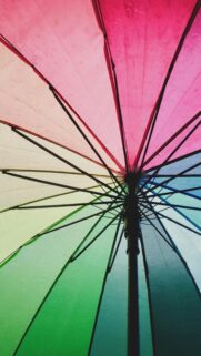 Vibrant Rainbow Umbrella Canopy Close-up Abstract Phone Wallpaper