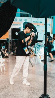 Professional Photographer at a Cosplay Photoshoot Mobile Wallpaper