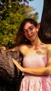 Fantasy Elf Girl in Pink Dress Beside a Tree Mobile Wallpaper