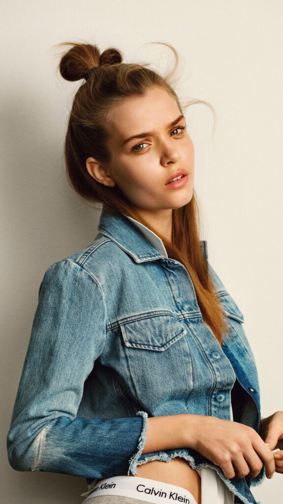 Stunning Fashion Portrait of a Beautiful Woman in a Denim Jacket Mobile Wallpaper