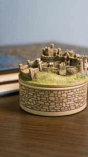 Miniature Medieval Stone Castle on Round Pedestal Desktop Wallpaper