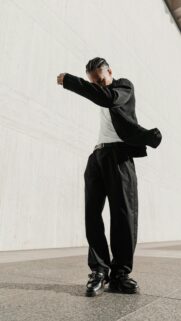 Stylish Man in Black Suit Urban Fashion Minimalist Mobile Wallpaper