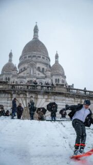 Snowboarding at Sacré-Cœur Paris in Snowy Weather Mobile Wallpaper