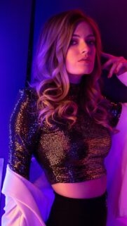 Stunning Fashion Portrait with Neon Pink and Blue Light Wallpaper