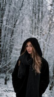Beautiful Girl in Winter Hooded Outfit Aesthetic Phone Wallpaper