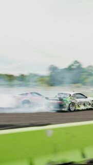 Drifting Nissan Silvia S14 and Chevy Corvette Action Wallpaper