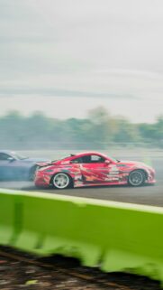 Red Drift Nissan 350Z JDM Sports Car Action Phone Wallpaper