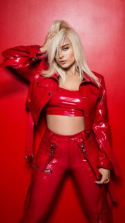 Bebe Rexha Stunning Red Latex Outfit Portrait Wallpaper for Mobile