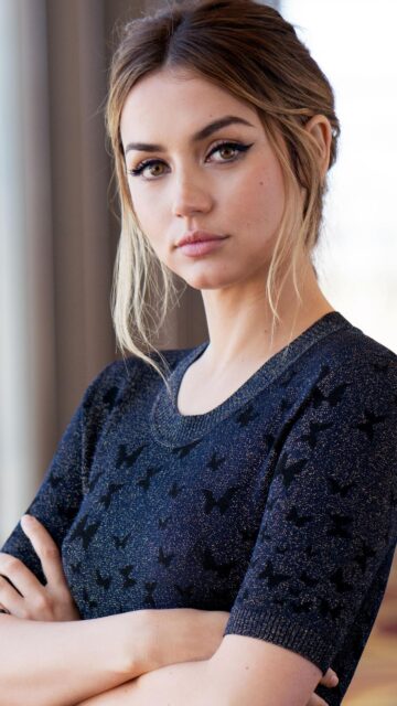 Stunning Portrait of Ana de Armas in a Butterfly Pattern Sweater Wallpaper