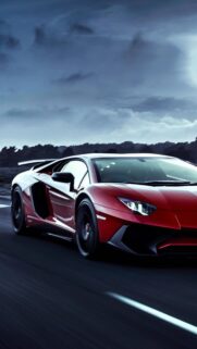Red Lamborghini Vision Board for Manifesting Wealth and Success Wallpaper
