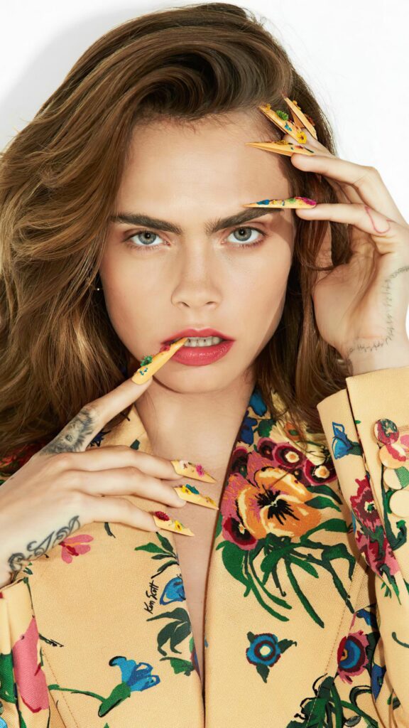 Stunning Portrait of Cara Delevingne with Floral Aesthetic High Resolution Mobile Wallpaper